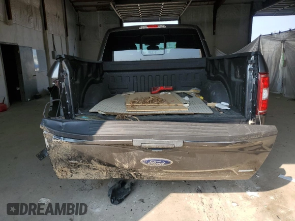 2020 Ford F-150 XL with VIN 1FTEW1E44LFC02735, listed as a Copart auction lot 62062125 with 111,471 mi miles and Salvage title. Bid and sale history available at DreamBid. Image 6.