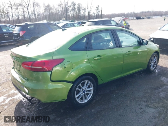 2018 Ford Focus SE with VIN 1FADP3FE7JL237818, listed as a IAAI auction lot 41729205 with 66,702 mi miles. Bid and sale history available at carsss.com. Image 4.