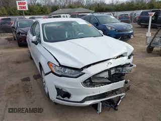 2020 Ford Fusion Hybrid SE with VIN 3FA6P0LU5LR195611, listed as a IAAI auction lot 41807998 with 128,439 mi miles. Bid and sale history available at carsss.com. Image 1.