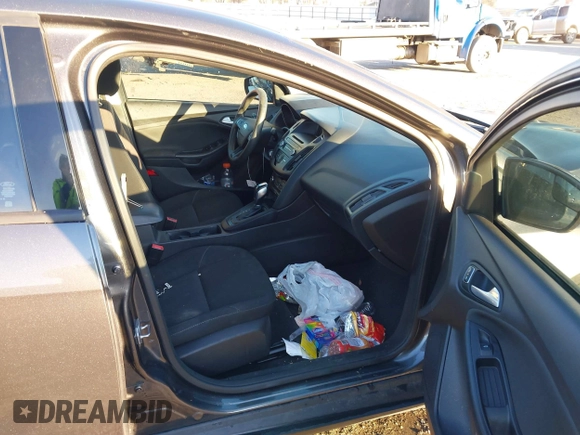 2015 Ford Focus SE with VIN 1FADP3F29FL384879, listed as a IAAI auction lot 41335839 with 107,871 mi miles. Bid and sale history available at carsss.com. Image 5.