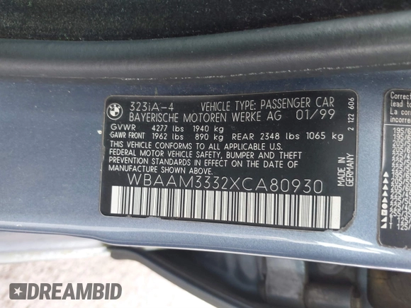 1999 BMW 3 Series 323i with VIN WBAAM3332XCA80930, listed as a IAAI auction lot 41827318 with 93,055 mi miles. Bid and sale history available at carsss.com. Image 9.