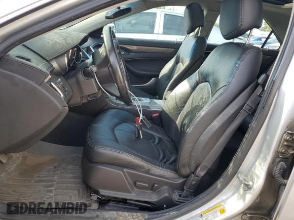 2012 Cadillac CTS with VIN 1G6DC5E56C0143293, listed as a Copart auction lot 63733405 with 244,318 mi miles and Salvage title. Bid and sale history available at DreamBid. Image 7.