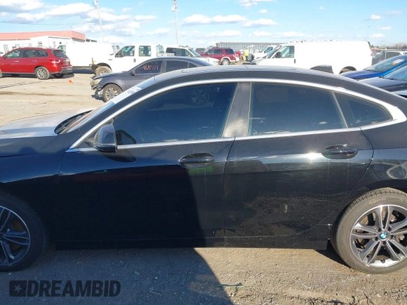 2021 BMW 2 Series 228i xDrive with VIN WBA73AK03M7H66827, listed as a IAAI auction lot 41682959 with 57,875 mi miles and . Bid and sale history available at DreamBid. Image 14.