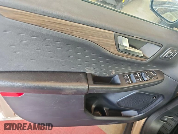 2020 Ford Escape Titanium Hybrid with VIN 1FMCU0DZ5LUB81972, listed as a IAAI auction lot 42679188 with 19,400 mi miles and . Bid and sale history available at DreamBid. Image 17.