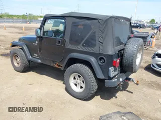 2006 Jeep Wrangler Sport with VIN 1J4FA49S76P718349, listed as a IAAI auction lot 42098356 with 137,804 mi miles and . Bid and sale history available at carsss.com. Image 3.