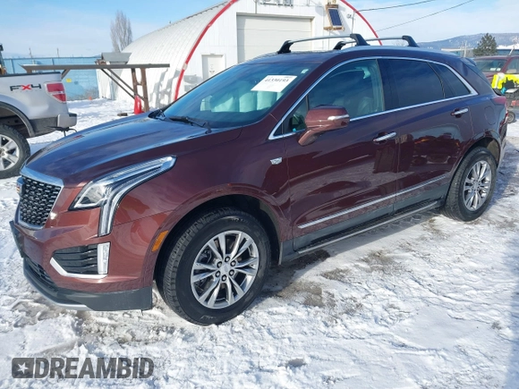 2022 Cadillac XT5 AWD Premium Luxury with VIN 1GYKNDRS9NZ128658, listed as a IAAI auction lot 41330193 with 34,361 mi miles and . Bid and sale history available at DreamBid. Image 18.