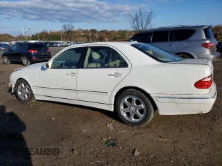2002 Mercedes-Benz E-Class with VIN WDBJF65J62B423016, listed as a Copart auction lot 79806394 with 154,537 mi miles and Salvage Title. Bid and sale history available at carsss.com. Image 2.