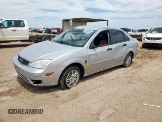 2005 Ford Focus S with VIN 1FAFP34N45W289763, listed as a Copart auction lot 59997915 with 88,234 mi miles and Salvage title. Bid and sale history available at DreamBid. Image 1.