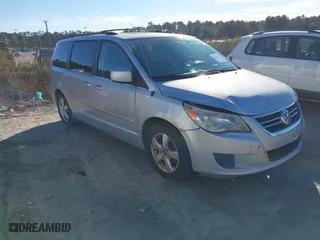 2009 Volkswagen Routan SE with VIN 2V8HW34189R559079, listed as a IAAI auction lot 41364533 with 126,357 mi miles. Bid and sale history available at carsss.com. Image 1.