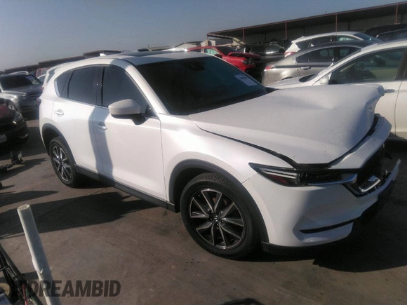 2018 Mazda CX-5 Grand Touring with VIN JM3KFADM4J0309540, listed as a IAAI auction lot 41868480 with 89,110 mi miles. Bid and sale history available at carsss.com. Image 1.