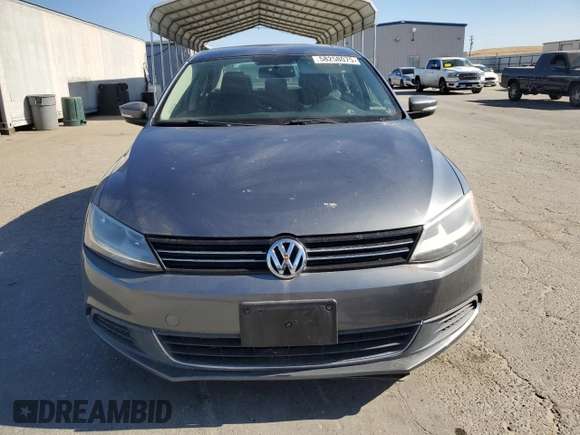 2014 Volkswagen Jetta SE with VIN 3VWD07AJXEM315231, listed as a Copart auction lot 58258075 with 99,860 mi miles and Salvage title. Bid and sale history available at DreamBid. Image 5.