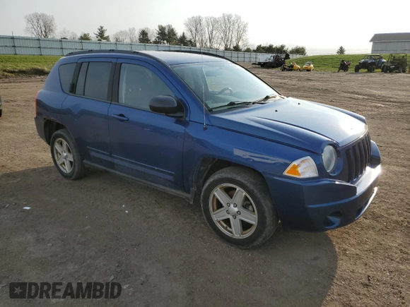 2010 Jeep Compass North Edition with VIN 1J4NF4FB2AD575774, listed as a Copart auction lot 52617805 with 130,645 mi miles and Clean Title. Bid and sale history available at carsss.com. Image 4.