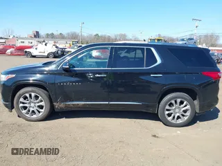 2018 Chevrolet Traverse Premier with VIN 1GNEVJKW8JJ159561, listed as a IAAI auction lot 41774914 with 132,598 mi miles and . Bid and sale history available at DreamBid. Image 14.