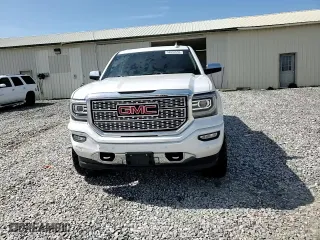 2018 GMC Sierra 1500 Denali with VIN 3GTU2PEJ9JG445453, listed as a Copart auction lot 50991655 with 114,828 mi miles and Salvage Title. Bid and sale history available at carsss.com. Image 14.