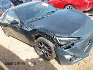 2013 Scion FR-S z VIN JF1ZNAA12D2734046, wystawiony jako IAAI lot #42298924 z przebiegiem 128 855 mil mil oraz . Historia ofert i sprzedaży dostępna na DreamBid. Obrazek 1.