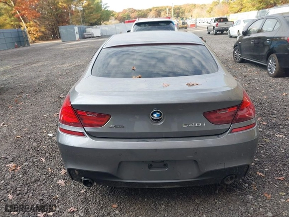2016 BMW 6 Series 640i xDrive with VIN WBA6D2C50GGT66007, listed as a IAAI auction lot 40673899 with 73,695 mi miles. Bid and sale history available at carsss.com. Image 16.
