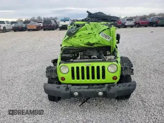 2013 Jeep Wrangler Unlimited Rubicon 10th Anniversary z VIN 1C4HJWFGXDL526535, wystawiony jako Copart lot #85209824 z przebiegiem Nie podano mil oraz Szkoda całkowita • Salvage title. Historia ofert i sprzedaży dostępna na DreamBid. Obrazek 10.