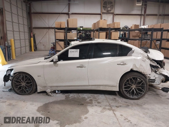 2018 Infiniti Q50 Sport z VIN JN1EV7AP5JM352872, wystawiony jako IAAI lot #42107252 z przebiegiem 81 889 mil mil oraz . Historia ofert i sprzedaży dostępna na DreamBid. Obrazek 15.