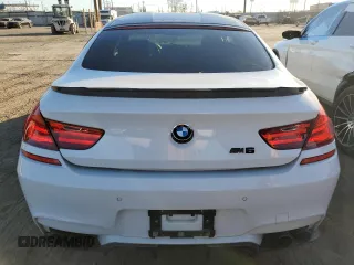2016 BMW M6 z VIN WBS6E9C59GG437108, wystawiony jako Copart lot #88536225 z przebiegiem 63 891 mil mil oraz Szkoda całkowita • Salvage title. Historia ofert i sprzedaży dostępna na DreamBid. Obrazek 6.