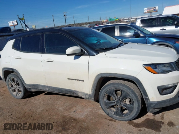 2019 Jeep Compass Latitude with VIN 3C4NJCBB9KT623674, listed as a IAAI auction lot 41455725 with 119,392 mi miles and . Bid and sale history available at DreamBid. Image 13.