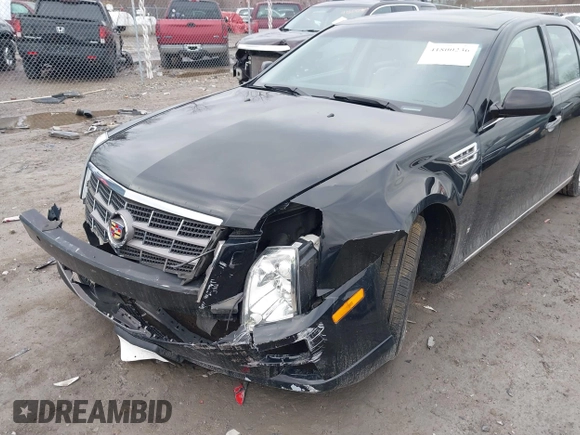 2009 Cadillac STS AWD z VIN 1G6DD67V290140111, wystawiony jako IAAI lot #41800236 z przebiegiem 81 913 mil mil oraz . Historia ofert i sprzedaży dostępna na DreamBid. Obrazek 6.