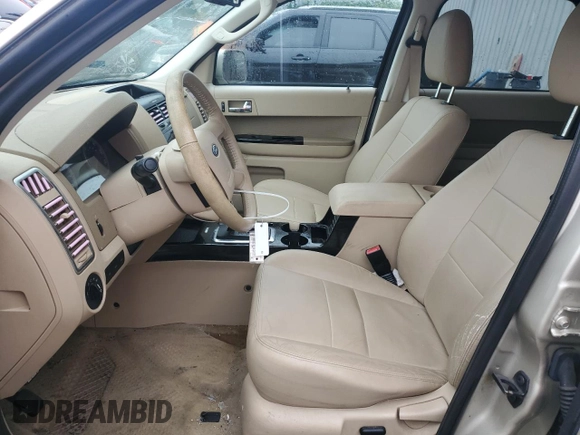 2010 Ford Escape Limited with VIN 1FMCU0EGXAKA03092, listed as a Copart auction lot 61094785 with 114,884 mi miles and Salvage title. Bid and sale history available at DreamBid. Image 7.