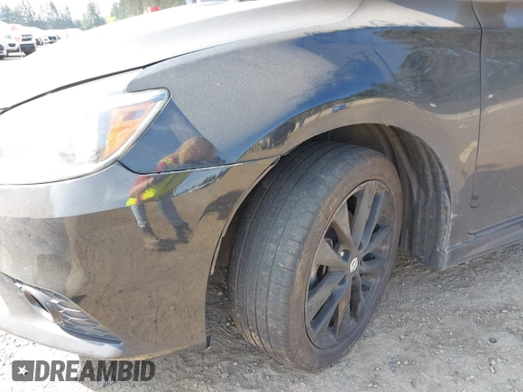 2018 Nissan Sentra S with VIN 3N1AB7AP2JY287421, listed as a IAAI auction lot 42110872 with 136,858 mi miles and . Bid and sale history available at DreamBid. Image 6.