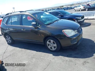 2009 Kia Rondo LX with VIN KNAFG528297238424, listed as a IAAI auction lot 41774050 with 203,211 mi miles. Bid and sale history available at carsss.com. Image 1.