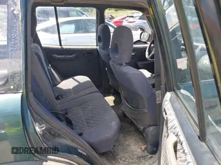 1998 Toyota RAV4 with VIN JT3GP10V6W0023680, listed as a IAAI auction lot 42235877 with 244,446 mi miles and . Bid and sale history available at DreamBid. Image 8.