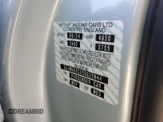 2005 Jaguar XJ Vanden Plas z VIN SAJWA82CX5SG35644, wystawiony jako Copart lot #49029245 z przebiegiem 88 771 mil mil oraz Szkoda całkowita • Salvage title. Historia ofert i sprzedaży dostępna na DreamBid. Obrazek 12.