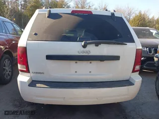2009 Jeep Grand Cherokee Laredo with VIN 1J8GS48K29C518895, listed as a IAAI auction lot 41161045 with 153,499 mi miles. Bid and sale history available at carsss.com. Image 17.