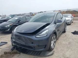 2023 Tesla Model Y Long Range with VIN 7SAYGDEE0PA036048, listed as a IAAI auction lot 41775845 with 41,291 mi miles. Bid and sale history available at carsss.com. Image 16.