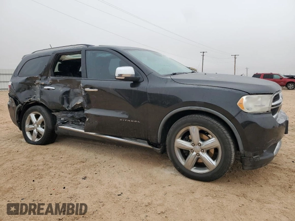 2012 Dodge Durango Citadel with VIN 1C4SDHET7CC180918, listed as a Copart auction lot 42714145 with 211,502 mi miles and Salvage title. Bid and sale history available at DreamBid. Image 4.