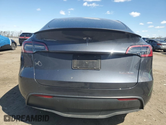 2023 Tesla Model Y Performance with VIN 7SAYGDEF3PF946496, listed as a Copart auction lot 50800315 with 15,077 mi miles and Salvage Title. Bid and sale history available at DreamBid. Image 6.