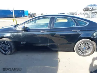 2017 Ford Fusion Energi SE with VIN 3FA6P0PU7HR373391, listed as a IAAI auction lot 41677525 with 99,499 mi miles. Bid and sale history available at carsss.com. Image 14.