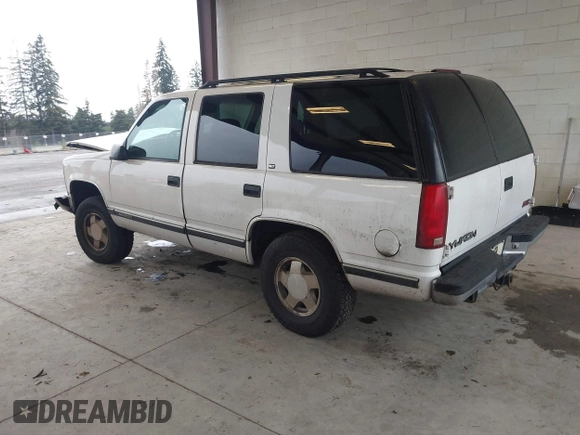 1998 GMC Yukon with VIN 1GKEK13R7WJ700881, listed as a IAAI auction lot 41507538 with 188,396 mi miles. Bid and sale history available at carsss.com. Image 3.