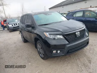 2021 Honda Passport EX-L with VIN 5FNYF8H57MB041815, listed as a IAAI auction lot 41654814 with 43,560 mi miles and . Bid and sale history available at DreamBid. Image 1.