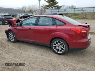 2015 Ford Focus SE with VIN 1FADP3F20FL340284, listed as a Copart auction lot 54115255 with 166,433 mi miles and Clean Title. Bid and sale history available at DreamBid. Image 2.