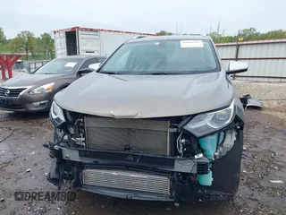 2019 Chevrolet Equinox Premier z VIN 3GNAXNEVXKS503474, wystawiony jako IAAI lot #42084263 z przebiegiem 93 838 mil mil oraz . Historia ofert i sprzedaży dostępna na DreamBid. Obrazek 6.
