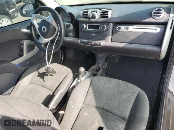 2014 Smart fortwo Pure z VIN WMEEJ3BA3EK780633, wystawiony jako Copart lot #54009185 z przebiegiem 104 688 mil mil oraz Tytuł czysty. Historia ofert i sprzedaży dostępna na DreamBid. Obrazek 8.