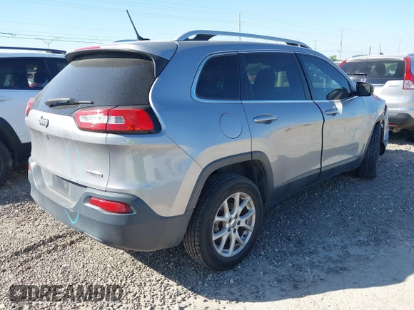 2017 Jeep Cherokee Latitude with VIN 1C4PJLCBXHW573751, listed as a IAAI auction lot 42220184 with 127,362 mi miles and . Bid and sale history available at DreamBid. Image 4.