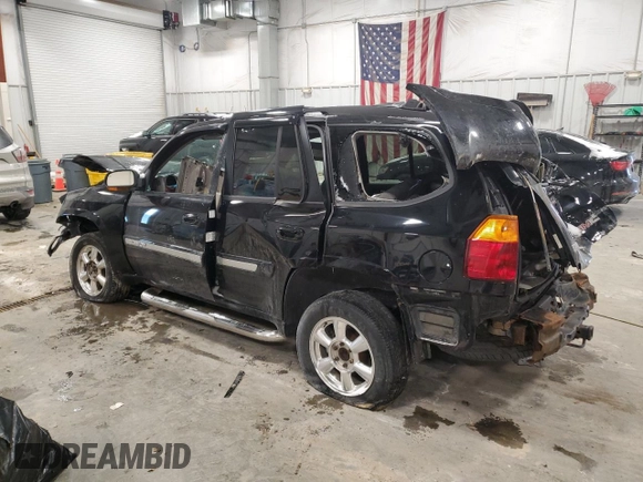 2003 GMC Envoy SLE with VIN 1GKDT13SX32206094, listed as a Copart auction lot 43734715 with 218,090 mi miles and Non Repairable. Bid and sale history available at carsss.com. Image 2.