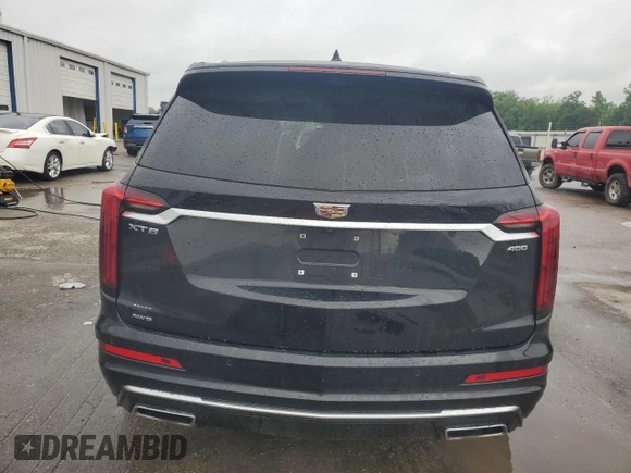 2023 Cadillac XT6 AWD Premium Luxury z VIN 1GYKPDRS8PZ119320, wystawiony jako Copart lot #52404785 z przebiegiem 41 629 mil mil oraz Szkoda całkowita • Salvage title. Historia ofert i sprzedaży dostępna na DreamBid. Obrazek 6.