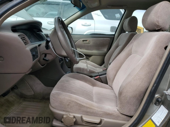 1998 Toyota Camry LE z VIN JT2BG28K7W0215608, wystawiony jako Copart lot #49919085 z przebiegiem 182 353 mil mil oraz Czysty tytuł • Clean title. Historia ofert i sprzedaży dostępna na DreamBid. Obrazek 7.