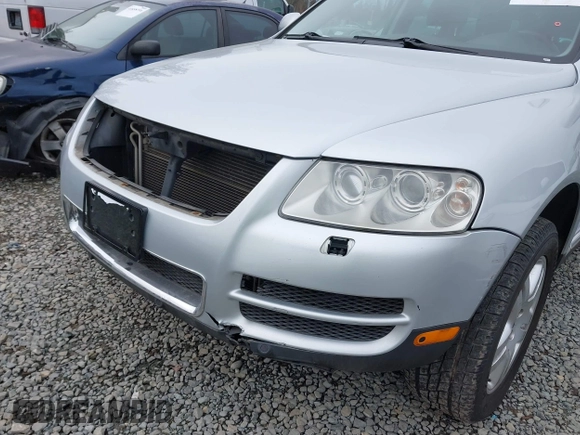 2006 Volkswagen Touareg 4.2L V8 z VIN WVGZM77L06D043948, wystawiony jako IAAI lot #41839431 z przebiegiem 207 496 mil mil oraz . Historia ofert i sprzedaży dostępna na DreamBid. Obrazek 6.