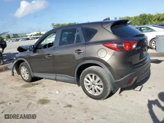 2016 Mazda CX-5 Sport with VIN JM3KE2BY5G0662568, listed as a Copart auction lot 51613115 with 0 mi miles and Non Repairable. Bid and sale history available at carsss.com. Image 2.