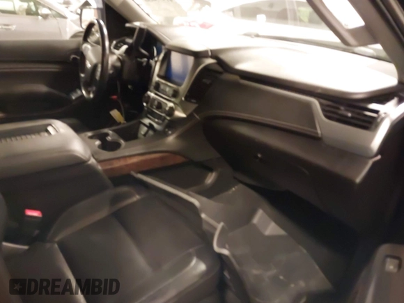 2017 Chevrolet Tahoe LT z VIN 1GNSKBKC6HR310870, wystawiony jako IAAI lot #41975056 z przebiegiem 124 418 mil mil oraz . Historia ofert i sprzedaży dostępna na DreamBid. Obrazek 5.