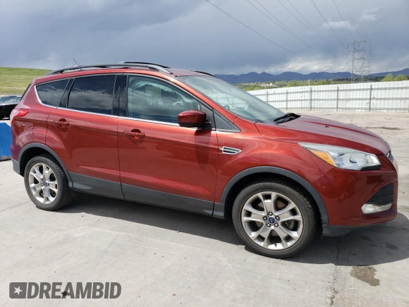 2016 Ford Escape SE z VIN 1FMCU9G9XGUC27074, wystawiony jako Copart lot #55788625 z przebiegiem 106 990 mil mil oraz Szkoda całkowita • Salvage title. Historia ofert i sprzedaży dostępna na DreamBid. Obrazek 4.