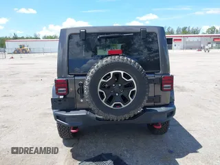 2017 Jeep Wrangler Unlimited Rubicon Recon with VIN 1C4HJWFG2HL560846, listed as a IAAI auction lot 42532745 with 101,285 mi miles and . Bid and sale history available at DreamBid. Image 16.