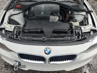 2014 BMW 3 Series 320i xDrive with VIN WBA3C3G50ENS67198, listed as a Copart auction lot 61654205 with 86,126 mi miles and Salvage title. Bid and sale history available at DreamBid. Image 11.